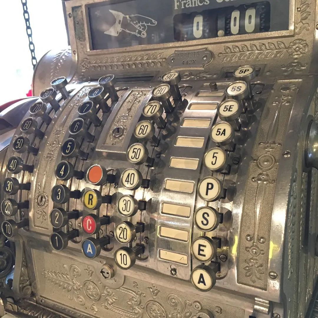 The keys of an antique cash register priced in francs