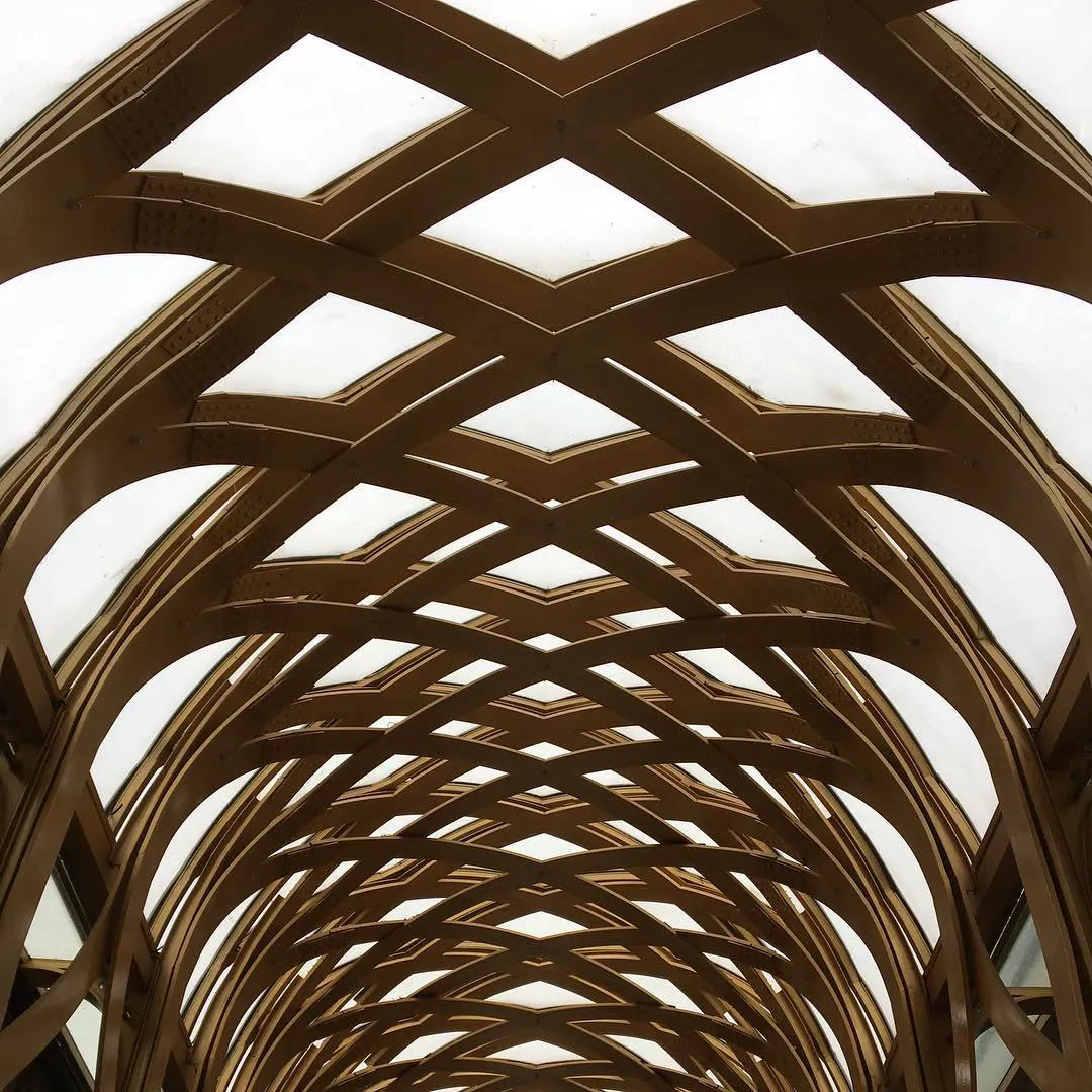 Looking up into a woven wooden lattice roof, in Hangzhou